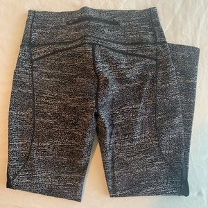 Lulu lemon cropped leggings, sheer side panels, side pockets, back zipper